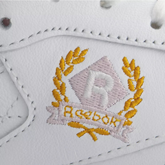 Women’s Classic Leather Lifestyle Sneakers – White & Frost Berry