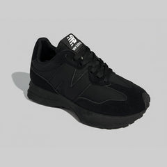 New Balance 327 black white sneakers retro running inspired design