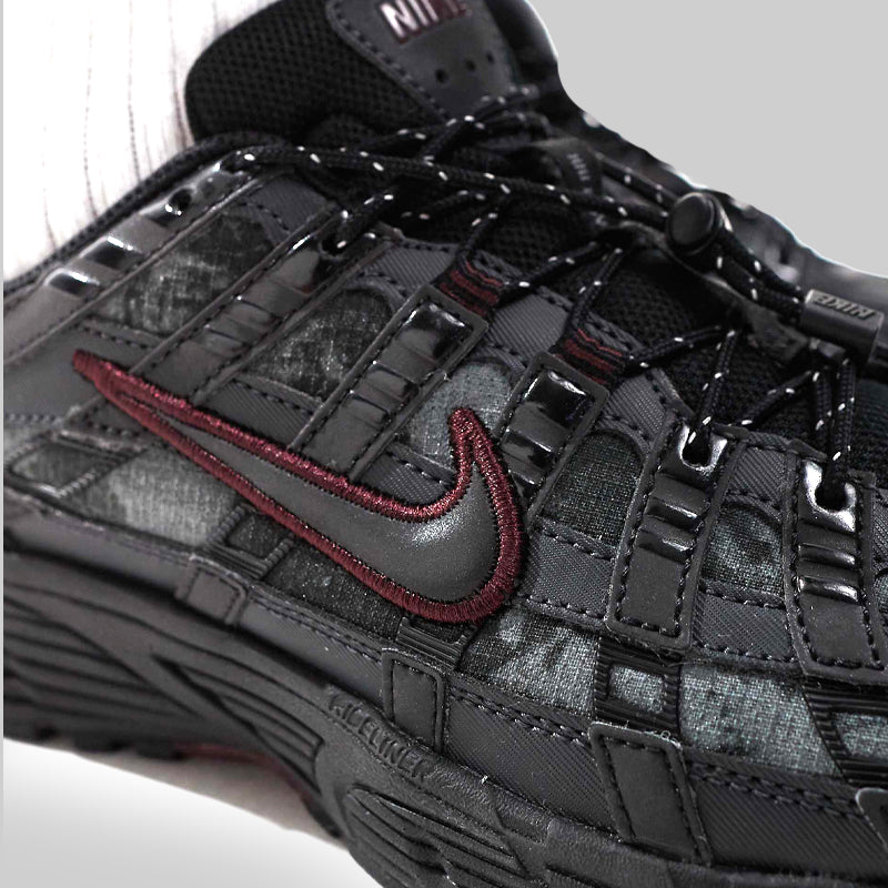 Nike P-6000 Black Burgundy men’s trainers worn on feet street style
