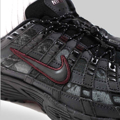 Nike P-6000 Black Burgundy men’s trainers worn on feet street style